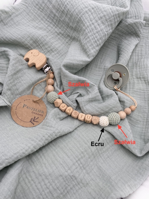 Personalizowana drewniana zawieszka do smoczka z koralików. Naturalne materiały, możliwość dodania imienia dziecka. Idealny prezent dla noworodka i niemowlęcia.